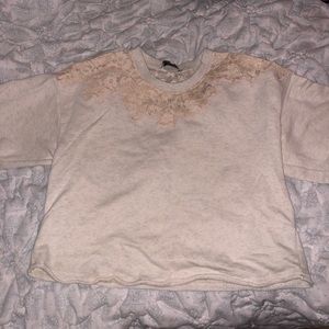 Cream Cropped sweatshirt with lace accents